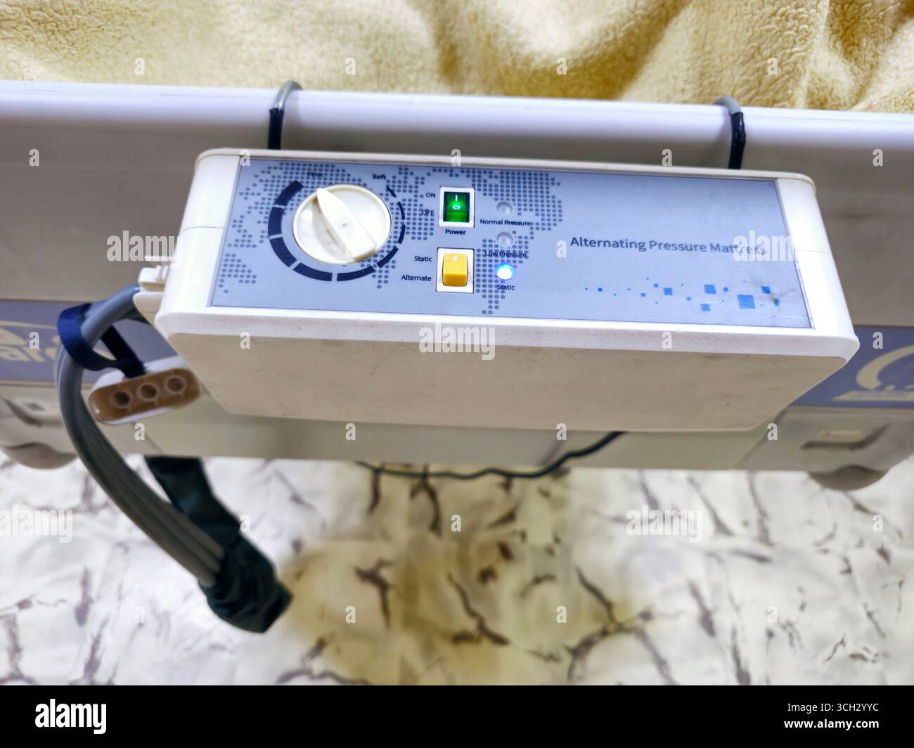 Cairo, Egypt, August 2 2025: The control unit of alternating pressure mattress, assembled with a row of lateral air cells that constantly alternate, c Stock Photo