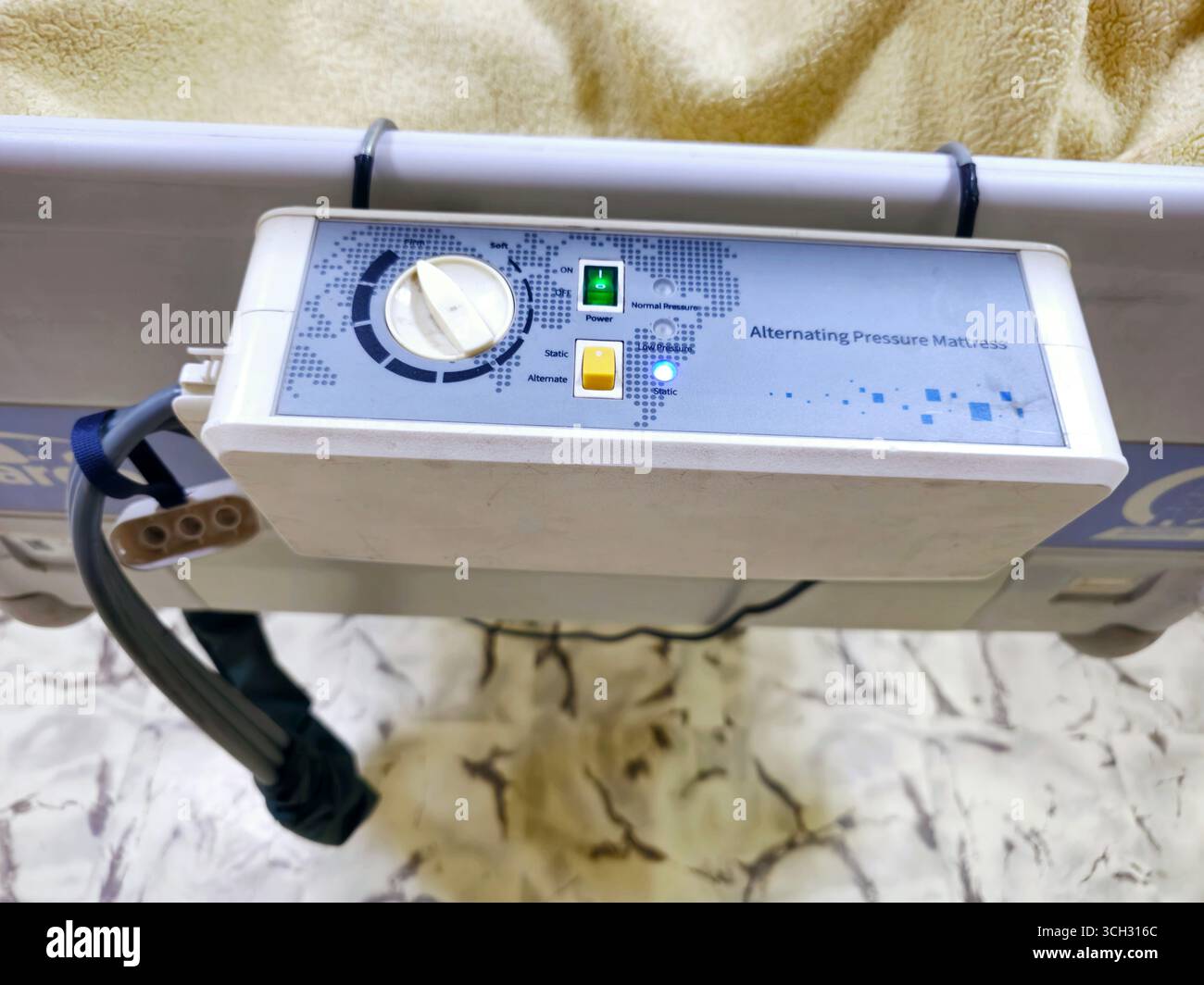 Cairo, Egypt, August 2 2025: The control unit of alternating pressure mattress, assembled with a row of lateral air cells that constantly alternate, c Stock Photo