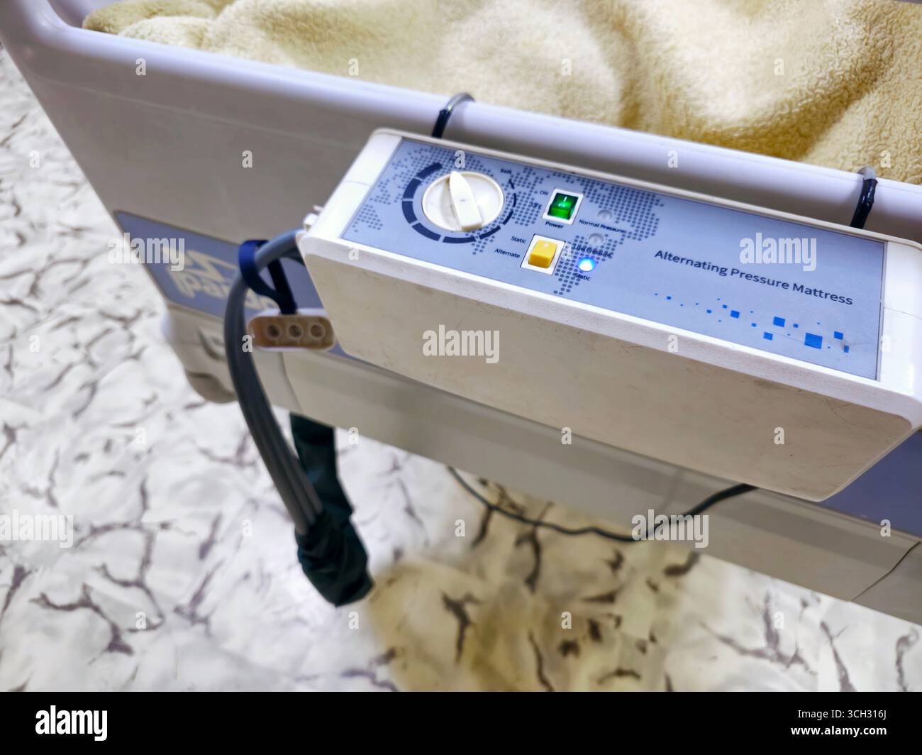 Cairo, Egypt, August 2 2025: The control unit of alternating pressure mattress, assembled with a row of lateral air cells that constantly alternate, c Stock Photo