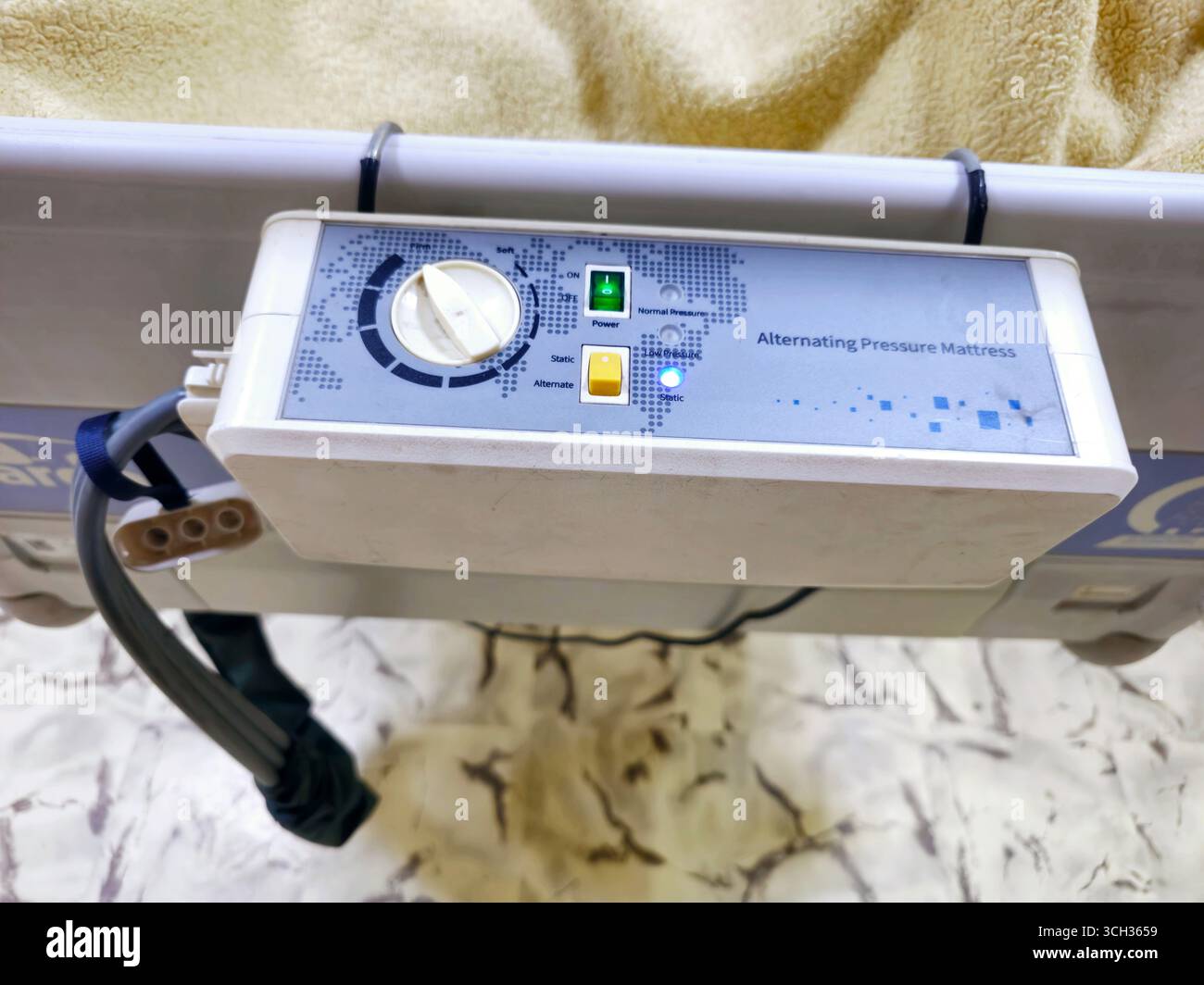 Cairo, Egypt, August 2 2025: The control unit of alternating pressure mattress, assembled with a row of lateral air cells that constantly alternate, c Stock Photo