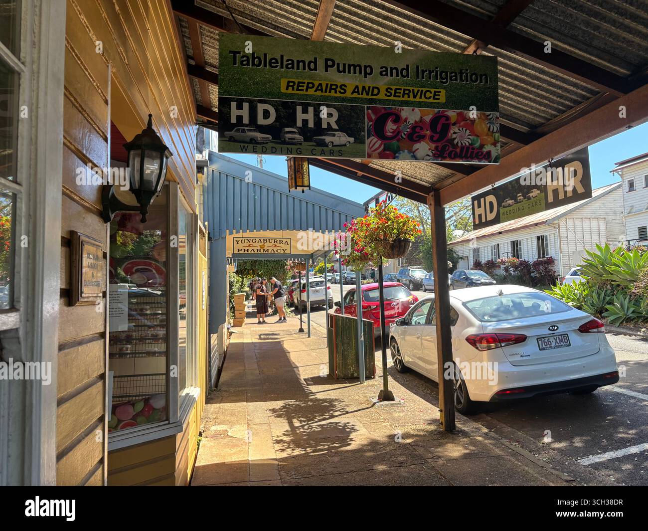 Shopping in cool heritage buildings, Tableland Pump & Irrigation, Yungaburra, Atherton Tablelands, near Cairns, Queensland, Australia. No MR or PR - Smartphone Captured Stock Image