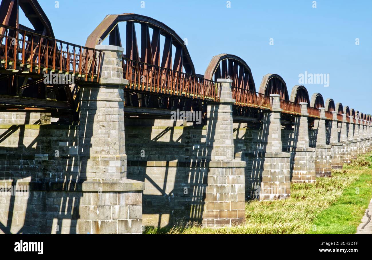 Bridge spanning river revealing architectural hi-res stock photography ...