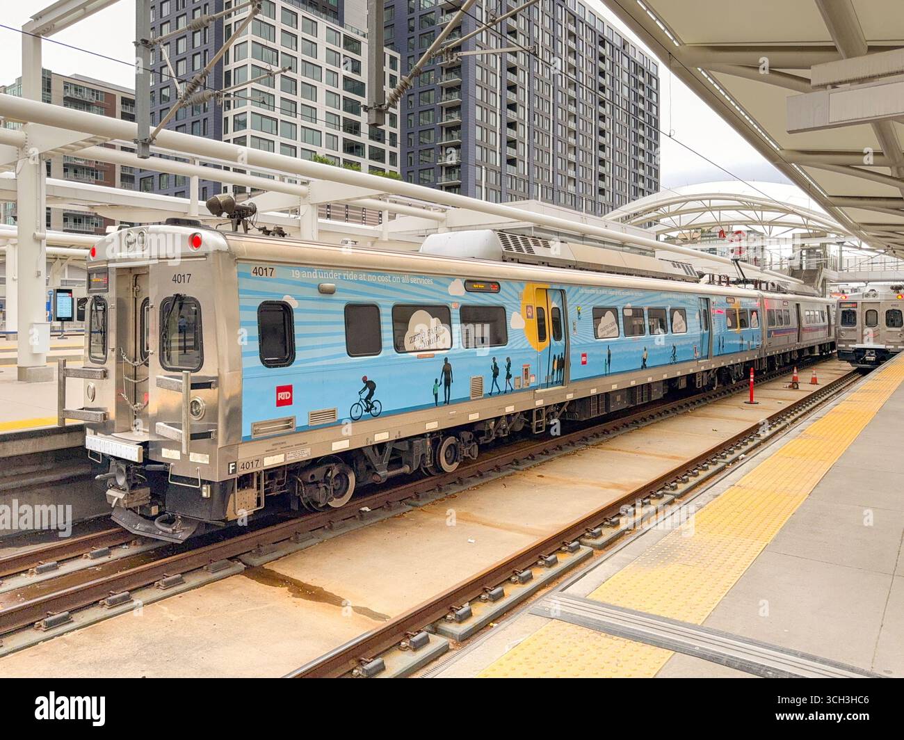 Denver, Colorado, USA - 2 June 2025: Commuter trains at platforms in Denver Union Station - Smartphone Captured Stock Image
