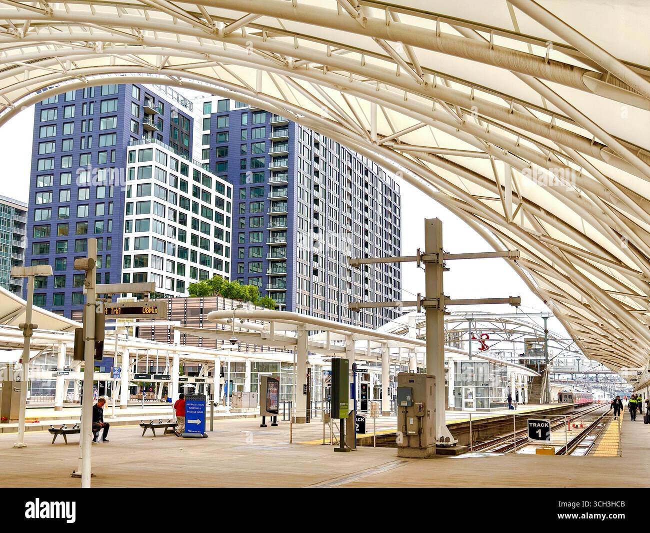 Denver, Colorado, USA - 2 June 2025: Wide angle view of the modern design canopy over platforms at Denver Union Station - Smartphone Captured Stock Image
