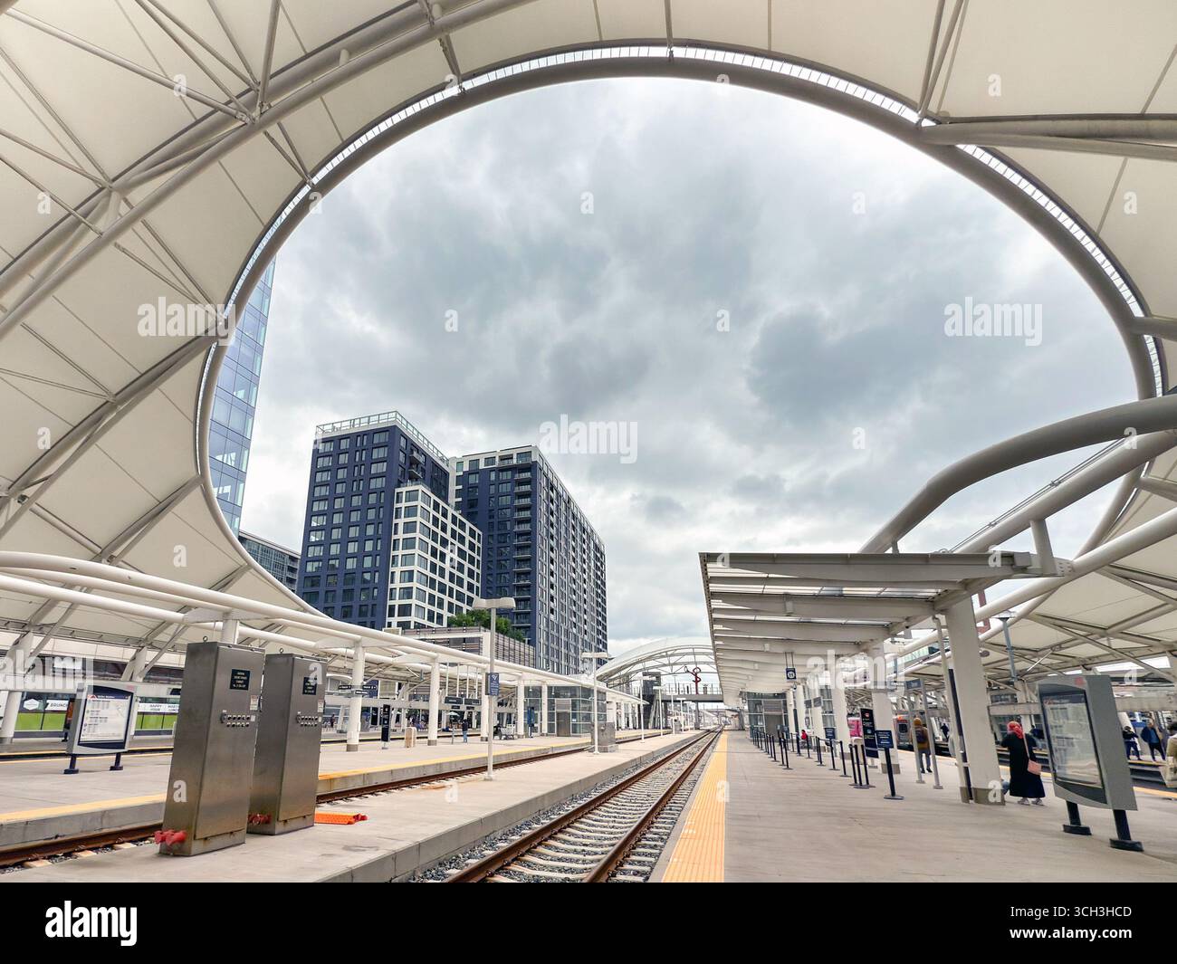 Denver, Colorado, USA - 2 June 2025: Wide angle view of the modern design canopy over platforms at Denver Union Station - Smartphone Captured Stock Image