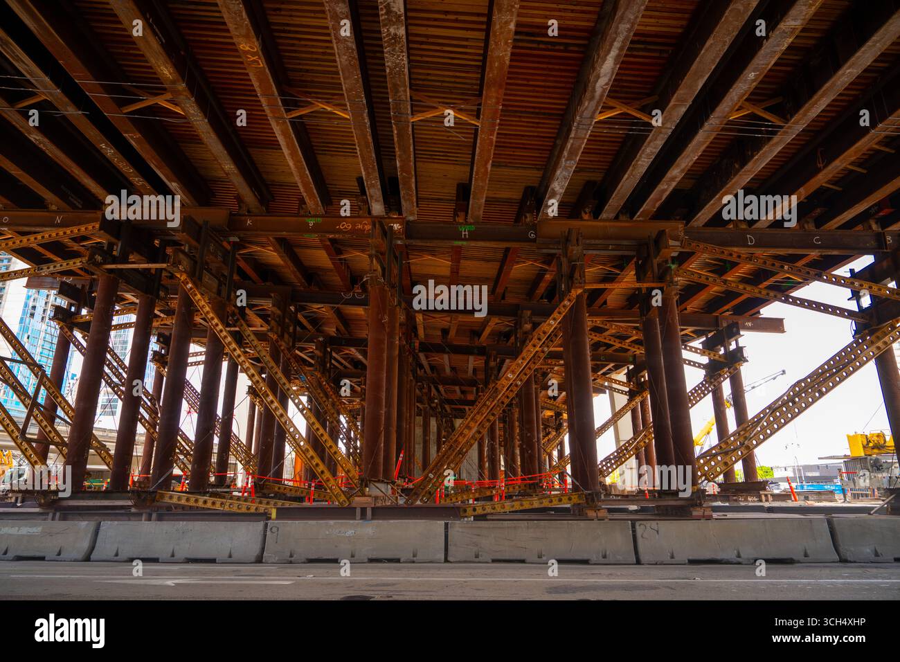 Metal bridge support under highway Stock Photo - Alamy
