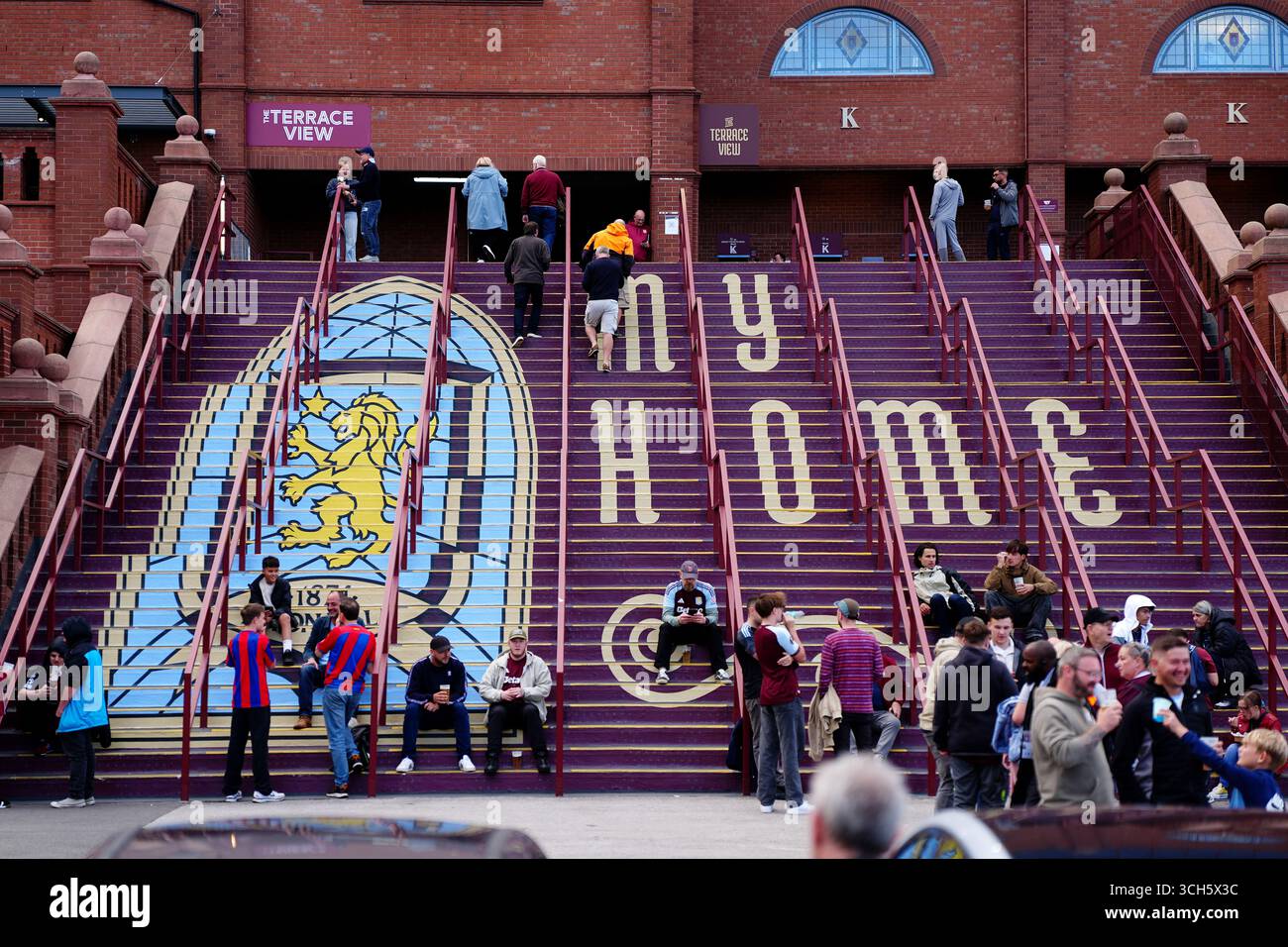 Aston Villa fans gather at the steps outside the Holte End at Villa Park, Birmingham ahead of the Premier League match between Aston Villa and Crystal Palace. Picture date: Sunday August 31, 2025. Stock Photo