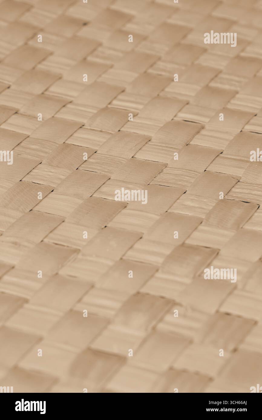 Thin strips of bamboo woven into a grid pattern background backdrop. Stock Photo