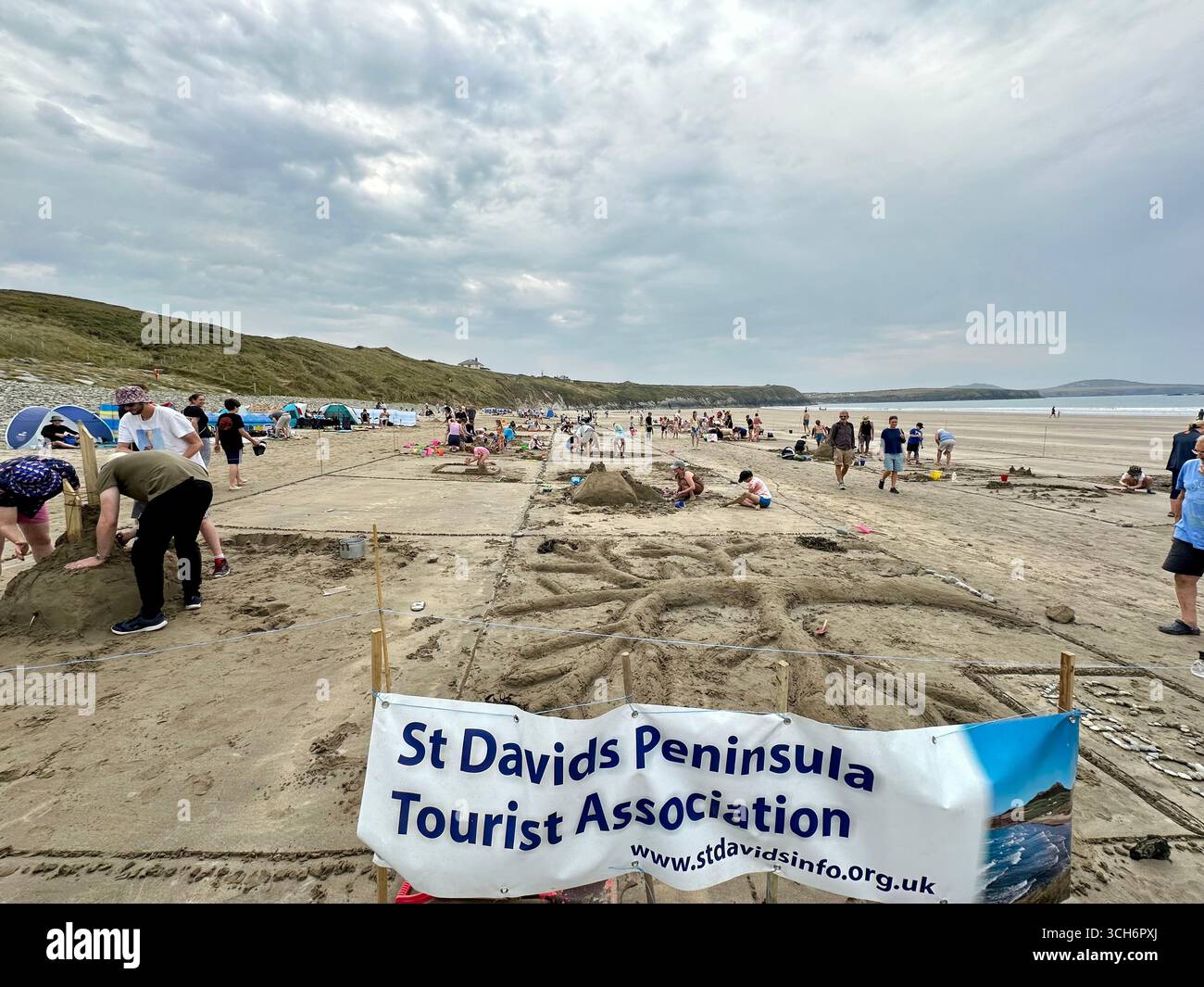 Sand church contest in St. Davids at Whitesands beach in Pembrokeshire in the summer 2025, Wales - Smartphone Captured Stock Image
