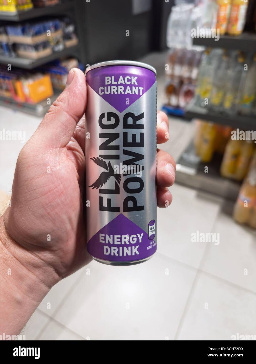 Budapest, Hungary - July 30, 2025: Hand holding Flying Power Black ...