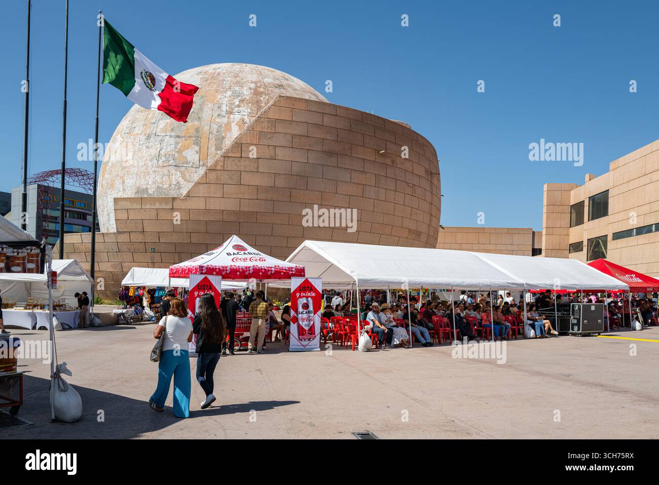 Tijuana, BC, Mexico - Aug. 2025: Vendors and audience at an event at CECUT,  a large cultural center located in Zona Río, near the U.S.–Mexico border. Stock Photo