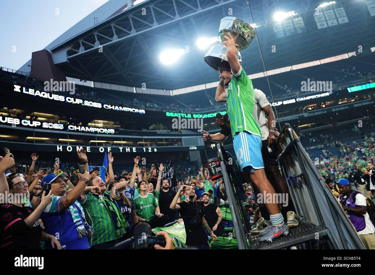 Seattle Sounders forward Pedro De La Vega holds up the Leagues Cup