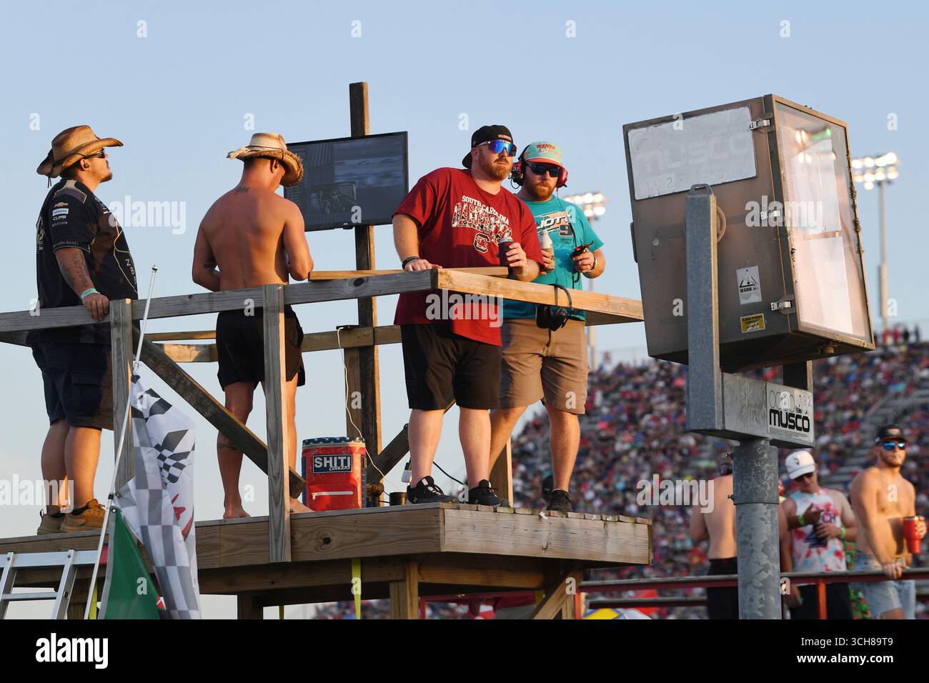DARLINGTON, SC - AUGUST 31: Fans in the infield watch action on the ...