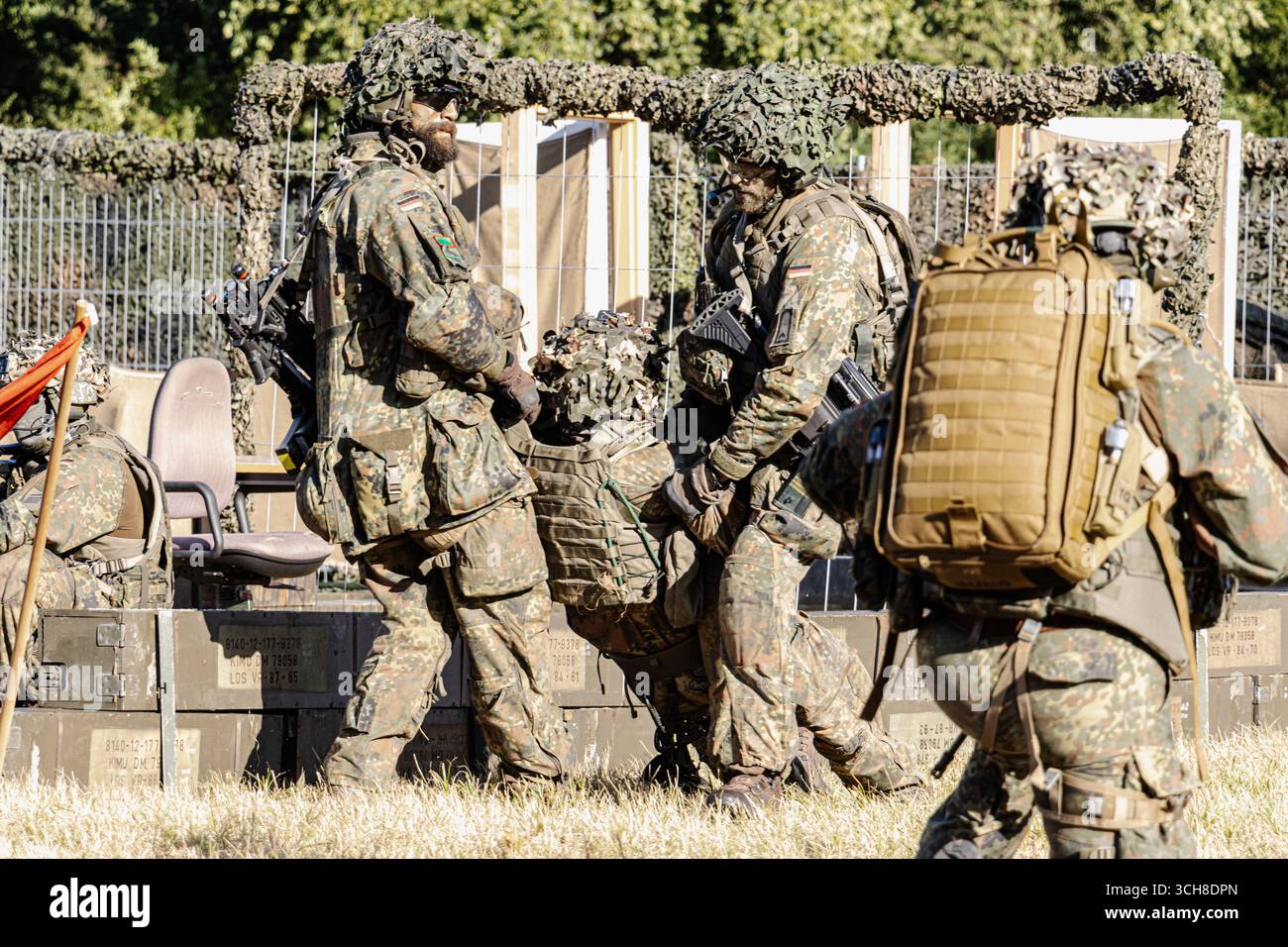 German Bundeswehr paratroopers in combat gear take part in a training ...