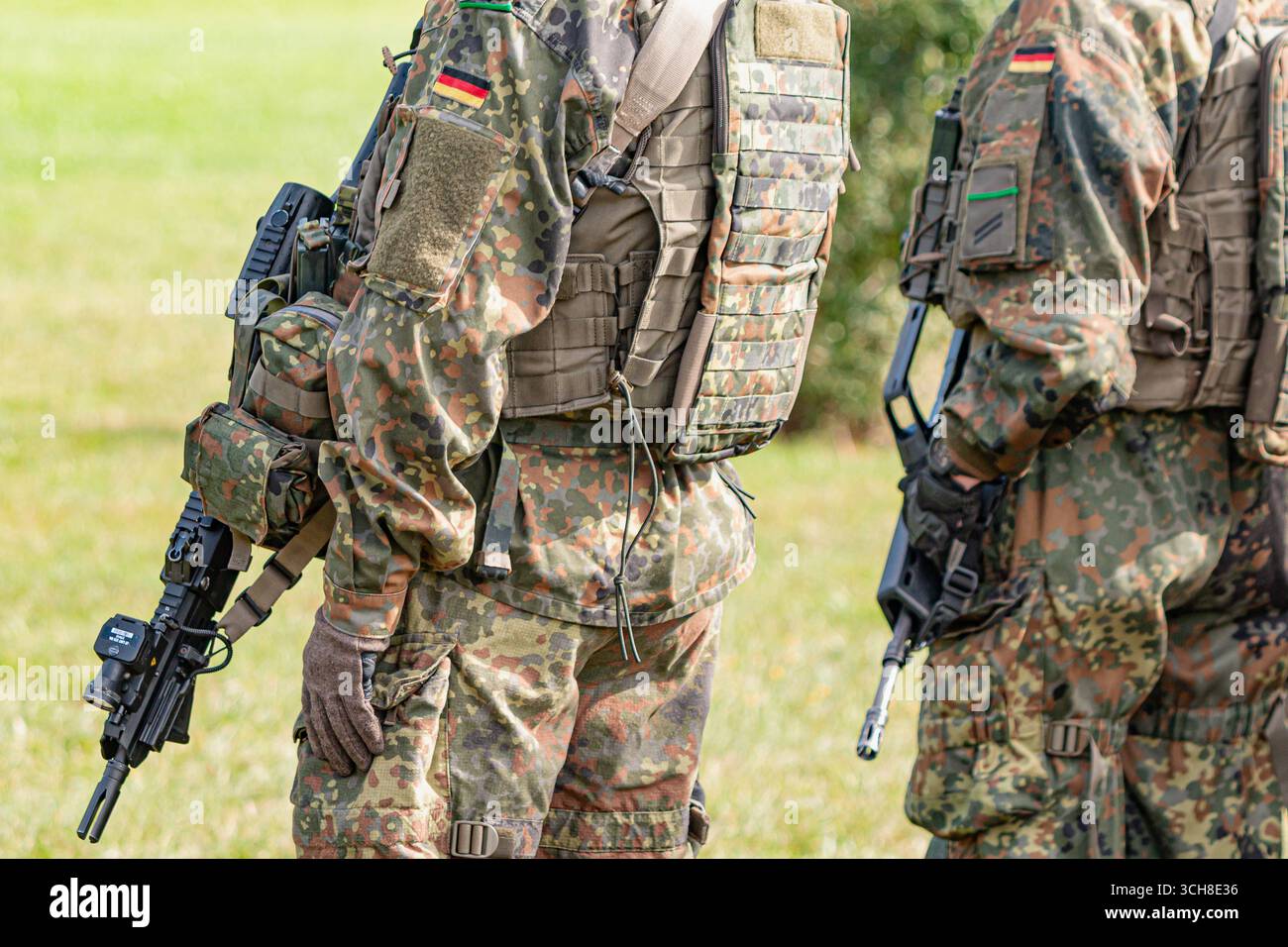 German Bundeswehr soldiers stand in formation wearing combat uniforms ...