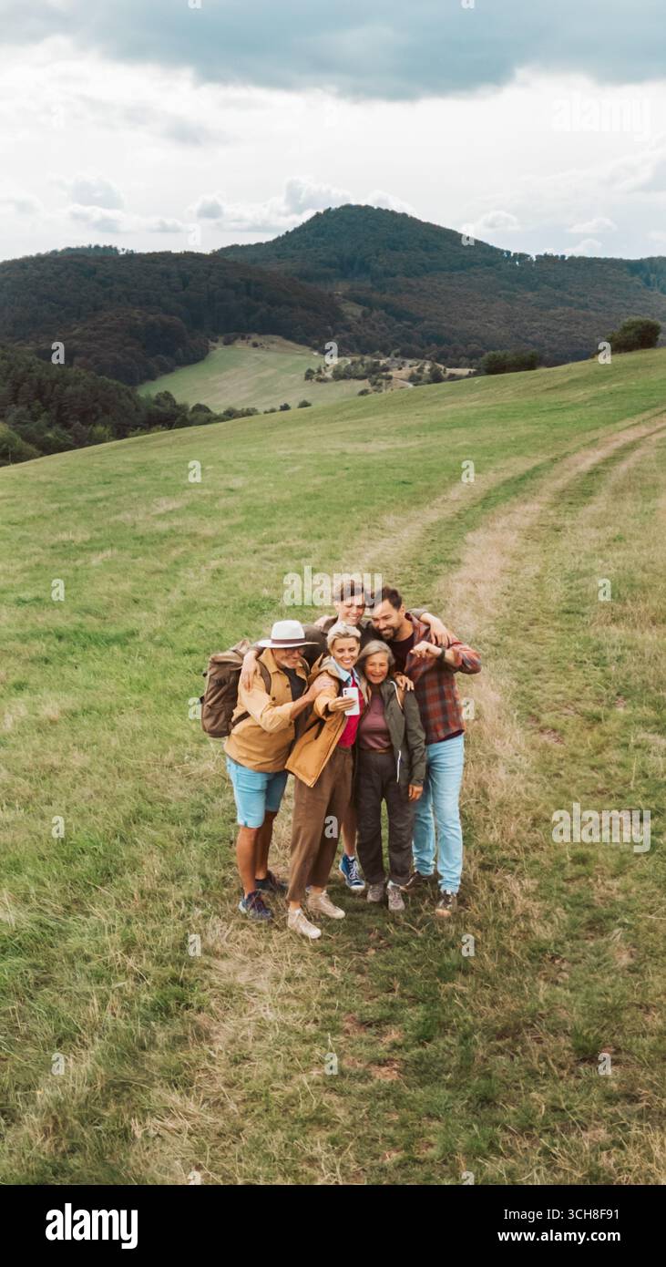 Aerial view happy family hiking hi-res stock photography and images - Alamy