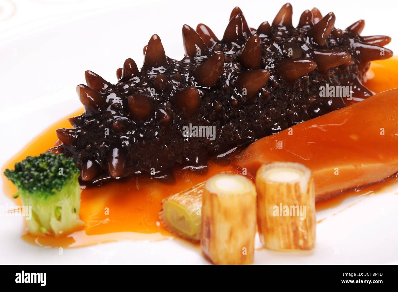 braised-sea-cucumber-with-white-mushroom-chinese-cuisine-stock-photo