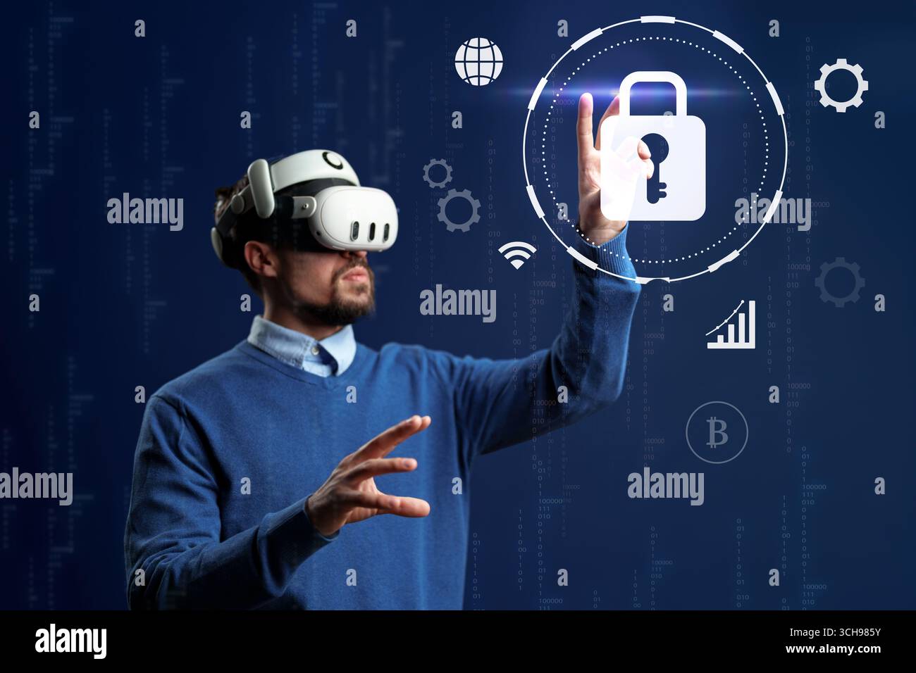 Virtual reality user interacts with digital security interface in a high-tech environment Stock Photo