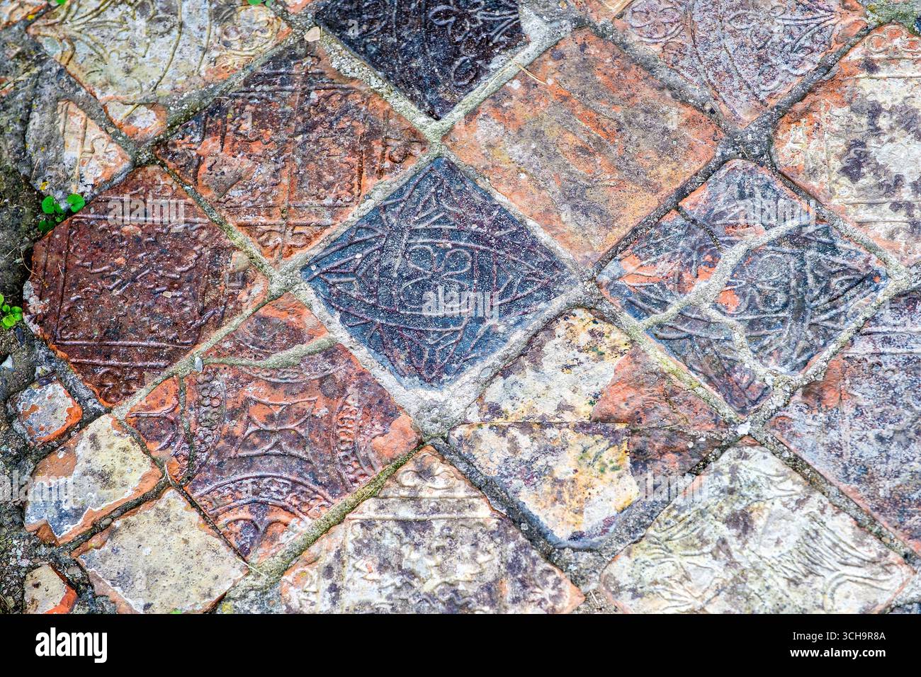 Medieval tiles at Strata Florida abbey ruins in mid Wales Stock Photo ...