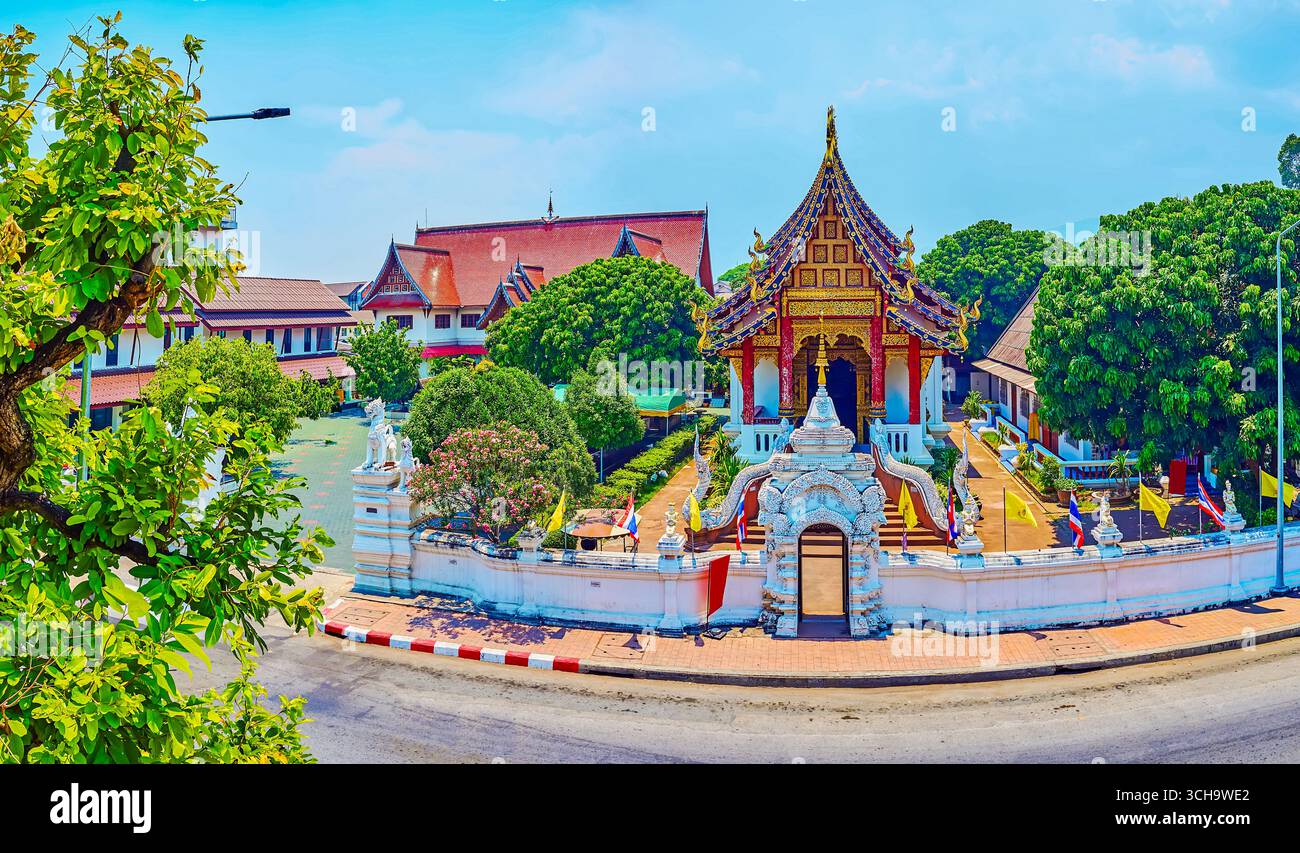 The top view of historic Wat Chang Taem with sculptured stucco gate and ...