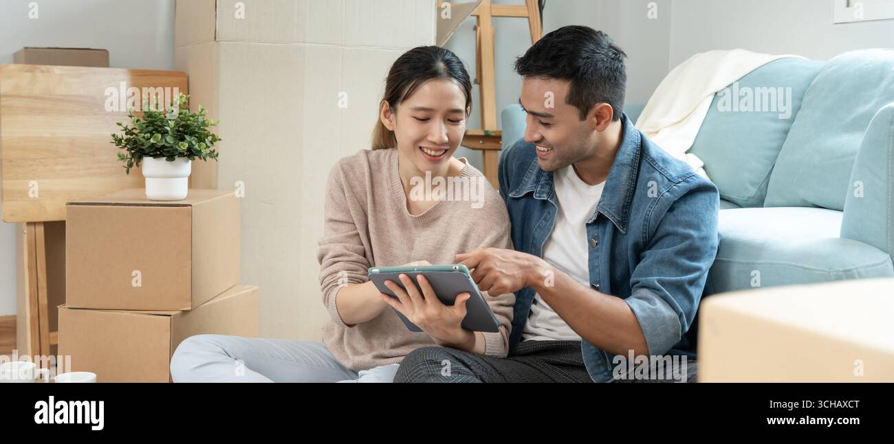 Moving house, relocation. Couple choose design for building new ...