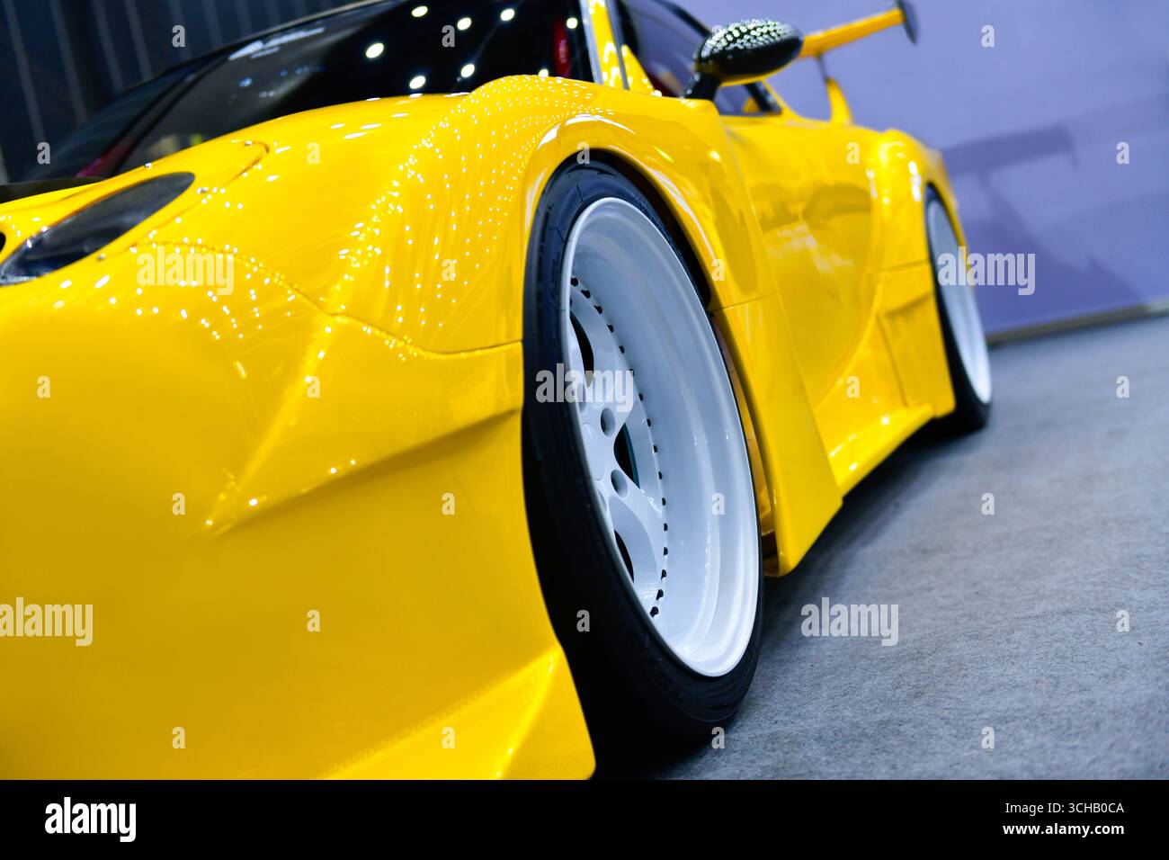 Front headlights of yellow modify car Stock Photo