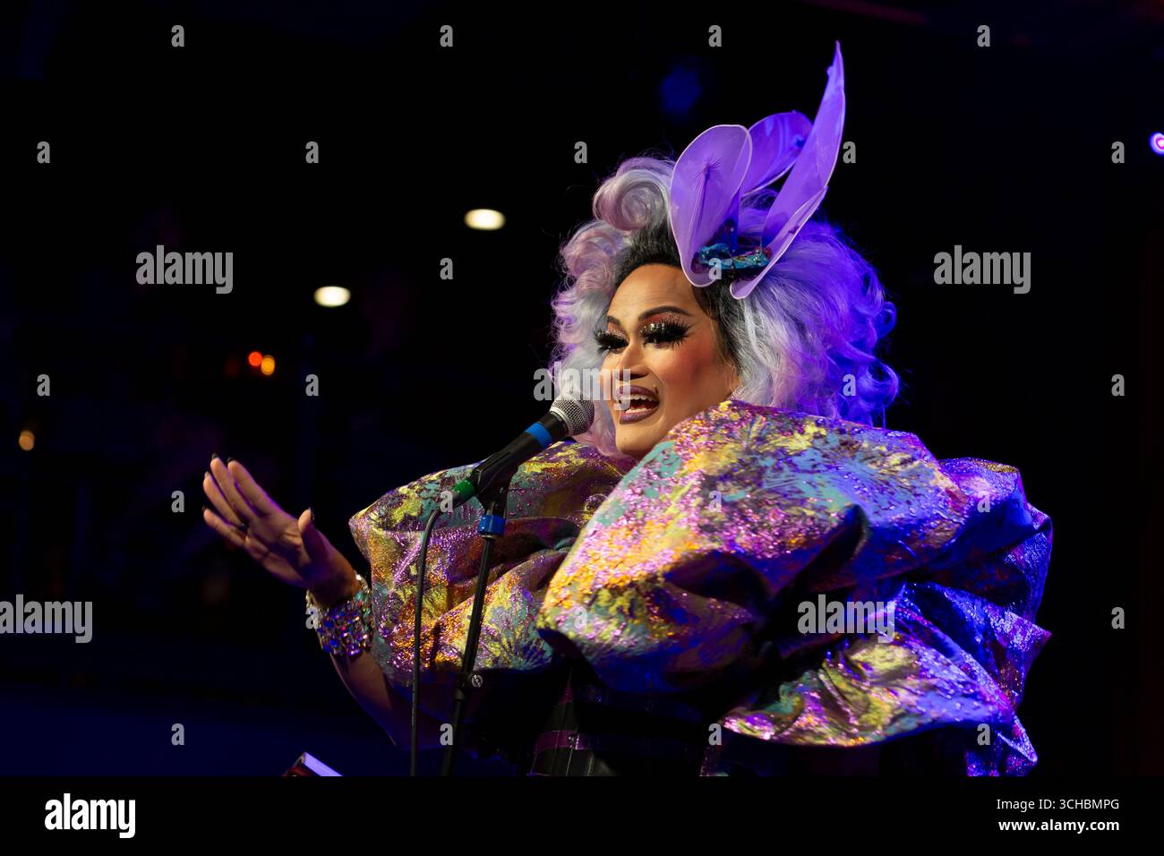 Host Aleksa Manila greets constituents at 'Candidate Survivor' at Neumos in Seattle on Thursday, July 24, 2025. At the annual political event, hosted Stock Photo