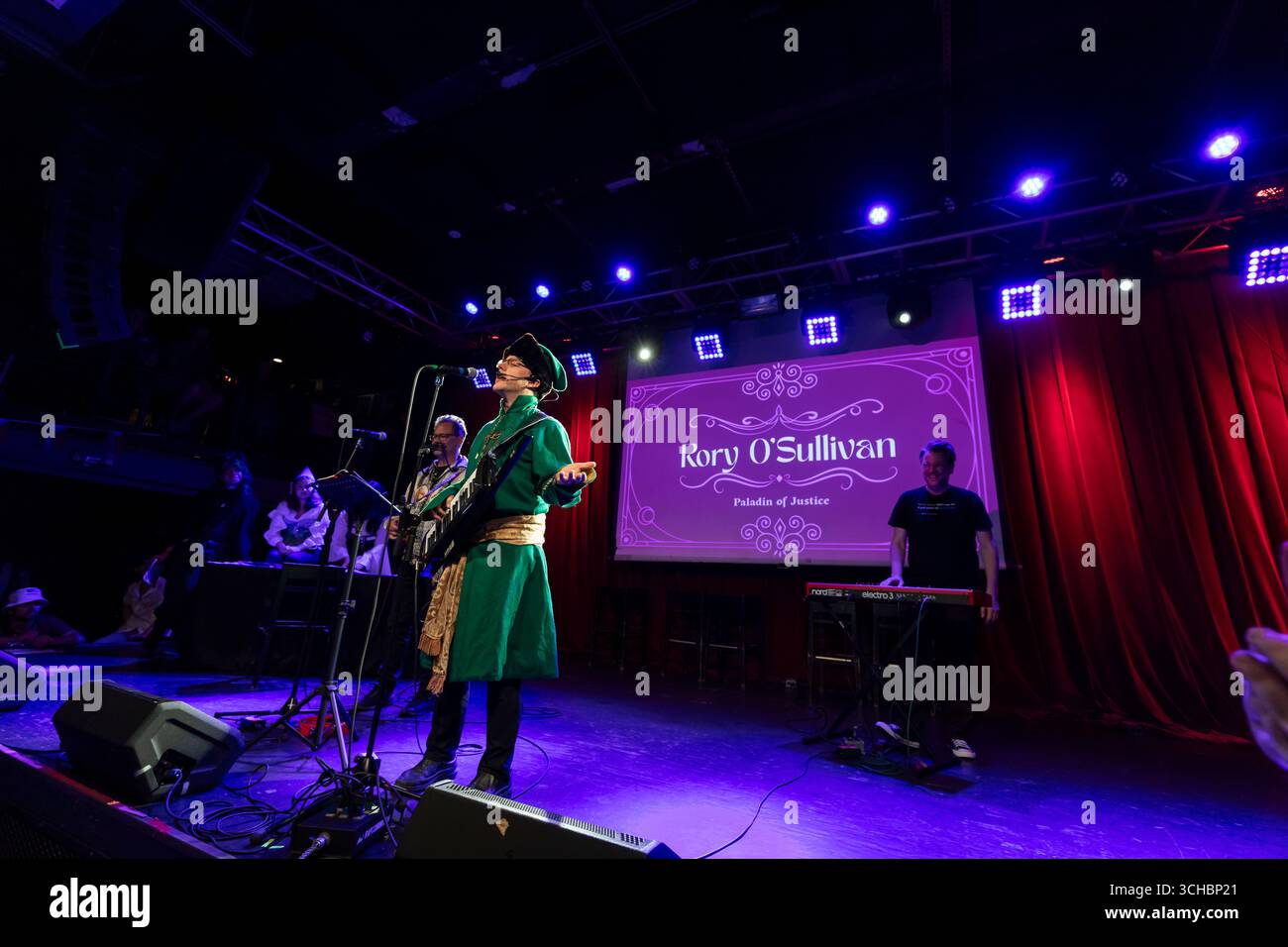 Rory O’Sullivan performs a classic Beatles song during 'Candidate Survivor' at Neumos in Seattle on Thursday, July 24, 2025. At the annual political e Stock Photo