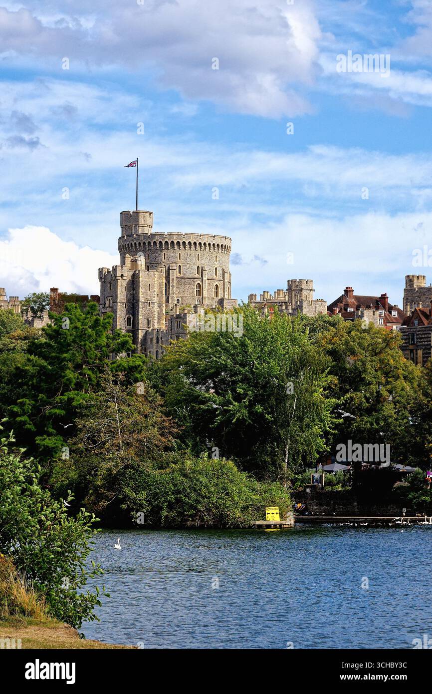 The riverside at Windsor with the Castle on the skyline on a sunny summers day Berkshire England UK Stock Photo