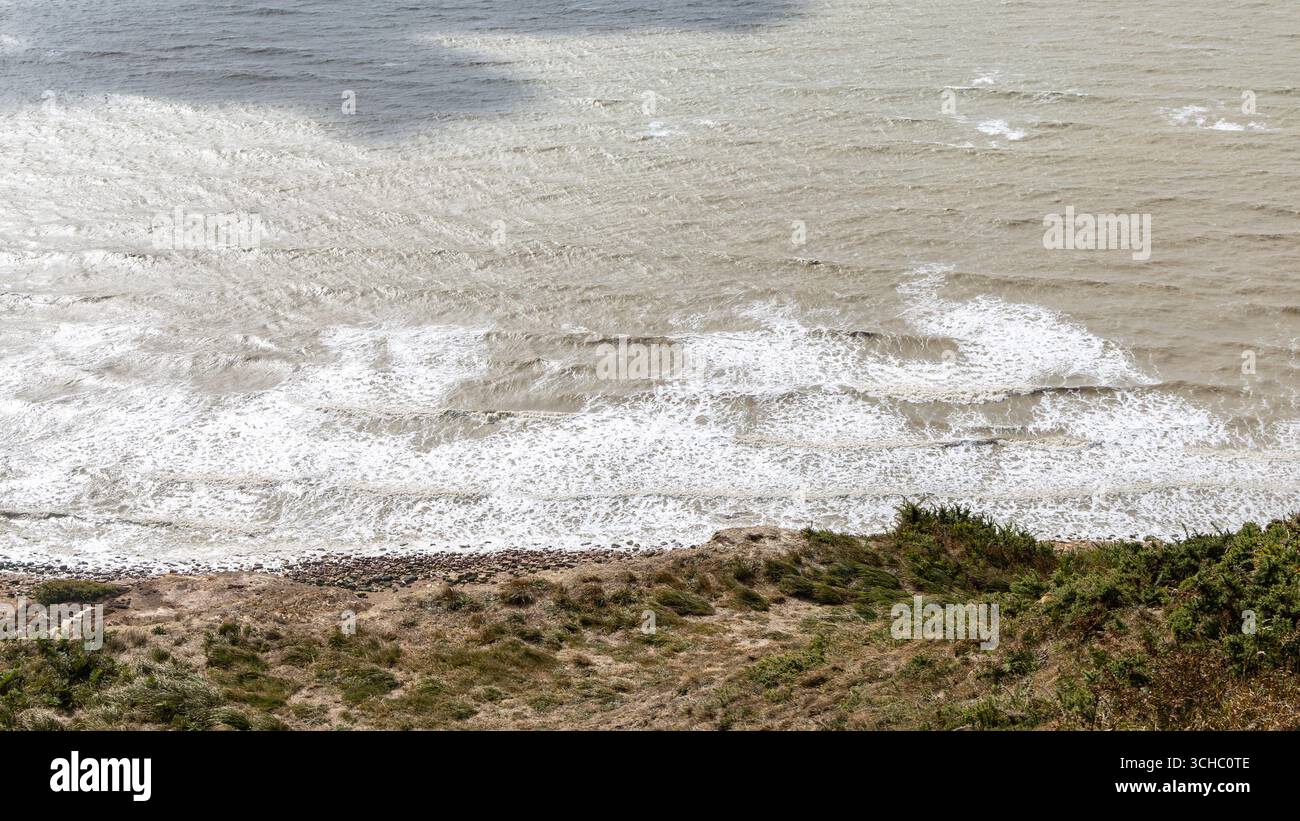 Waves Breaking on the Shore Stock Photo