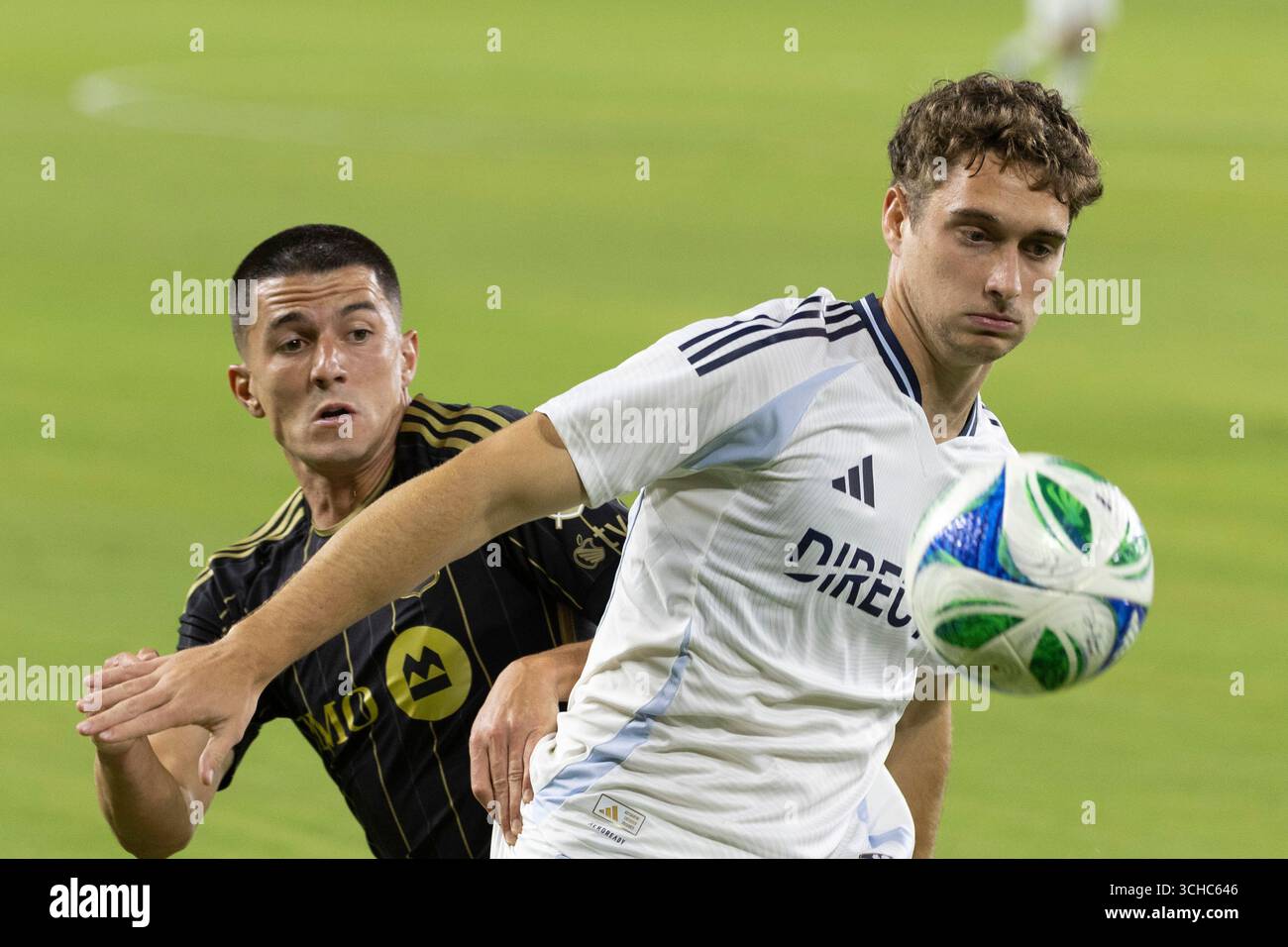 Diego Ringo Los Angeles FC's Sergi Palencia #14 and San Diego FC's Ian Pilcher #25 ...