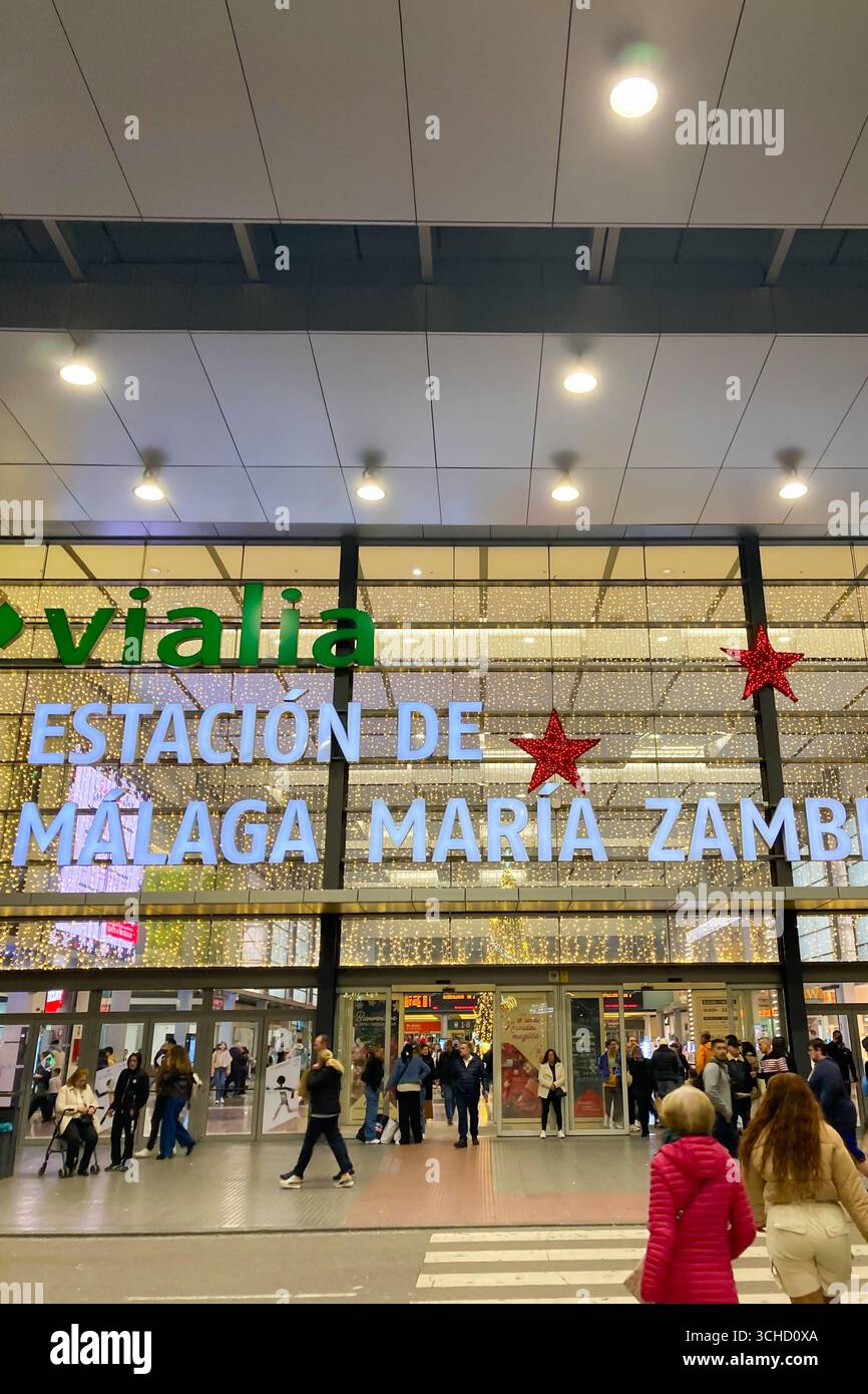 MALAGA, SPAIN - DECEMBER 21, 2024: The city center glows with enchanting Christmas decorations, creating a festive wonderland in Malaga, Spain - Smartphone Captured Stock Image