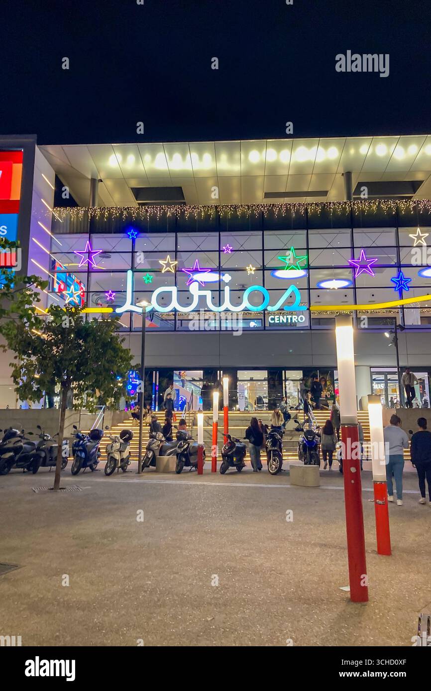 MALAGA, SPAIN - DECEMBER 21, 2024: The city center glows with enchanting Christmas decorations, creating a festive wonderland in Malaga, Spain - Smartphone Captured Stock Image