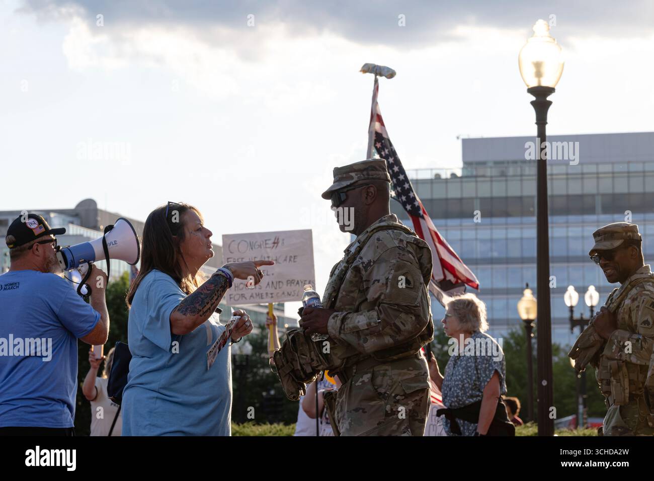 A protester confronts a member of the DC National Guard at Union ...