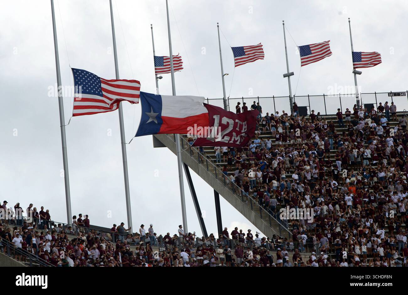COLLEGE STATION, TX - AUGUST 30: Flags representing the USA, Texas and ...