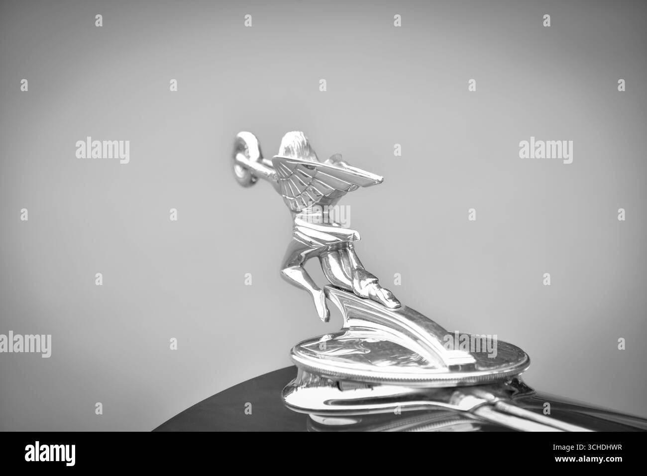 Isolated vintage hood ornament on a classic car at a car show Stock Photo