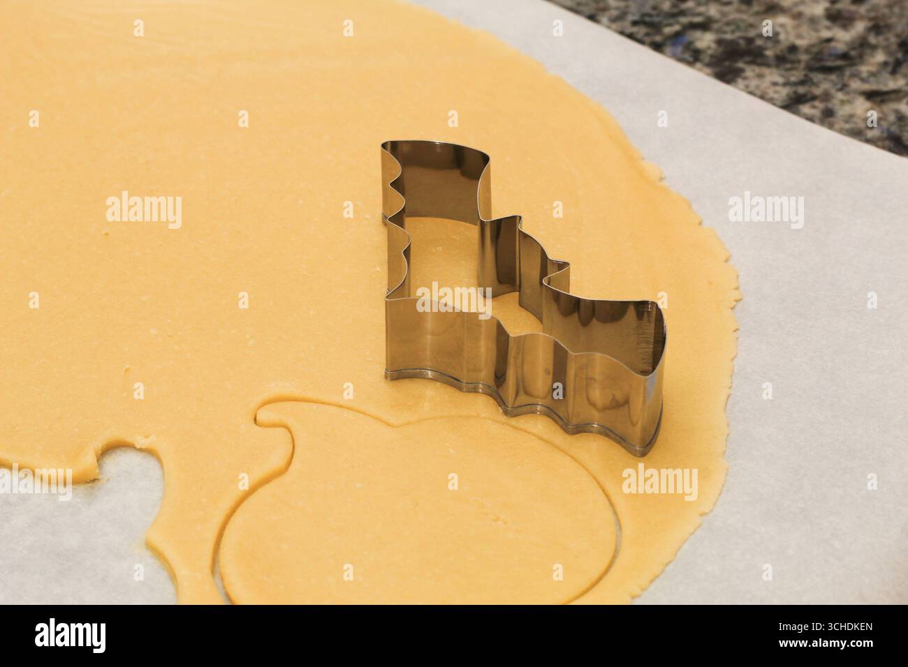 Halloween Bat Cookie Cutter on Cookie Dough Stock Photo