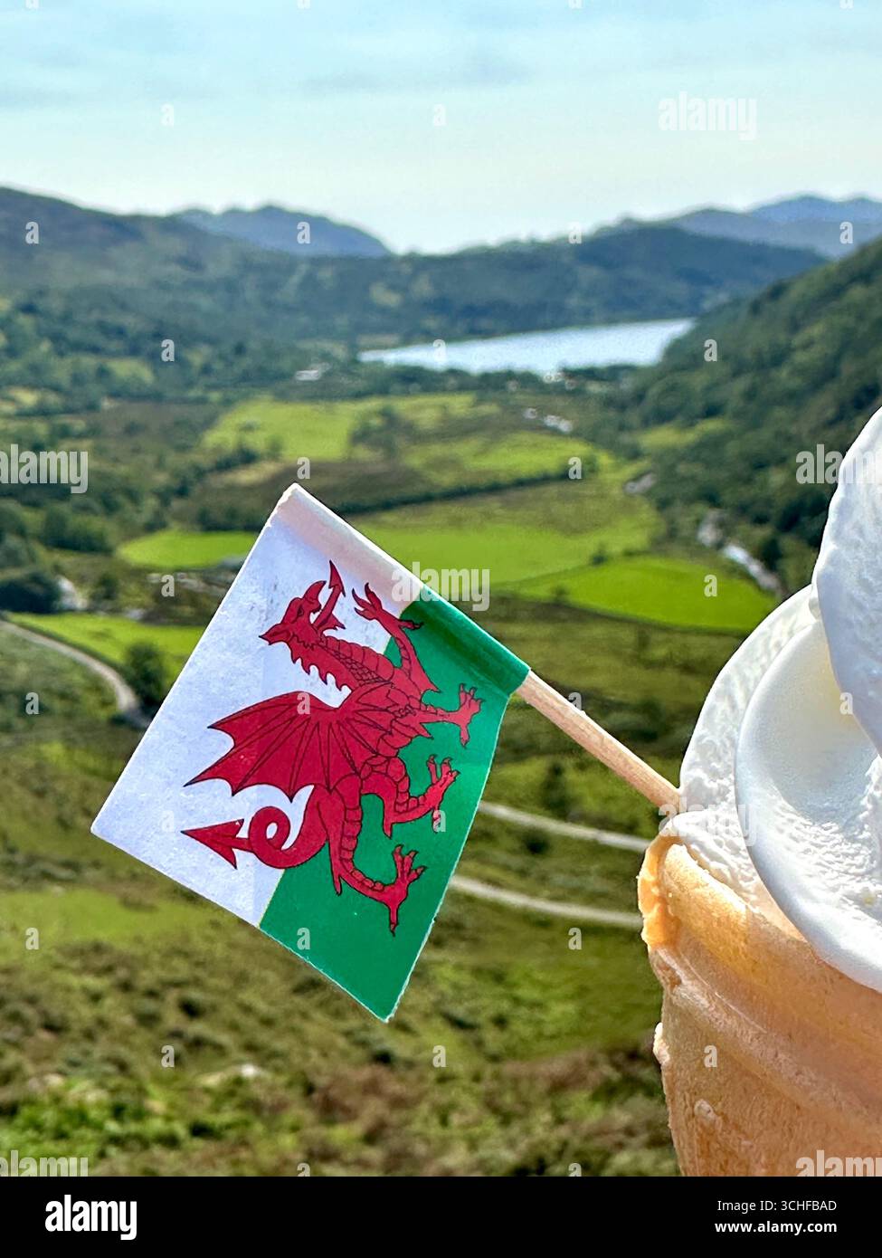 A Wales flag in typical Welsh landscape - Smartphone Captured Stock Image