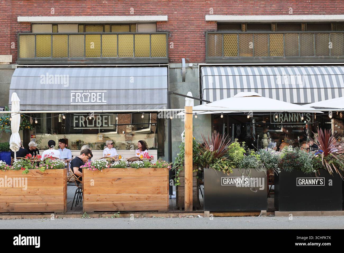 Restaurants on Westerstraat, in a lovely neighbourhood near the city park, Rotterdam, Netherlands. Stock Photo
