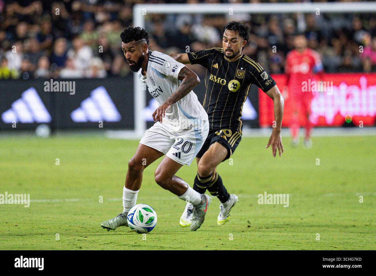 San Diego FC midfielder Anibal Godoy (20) is defended by LAFC ...