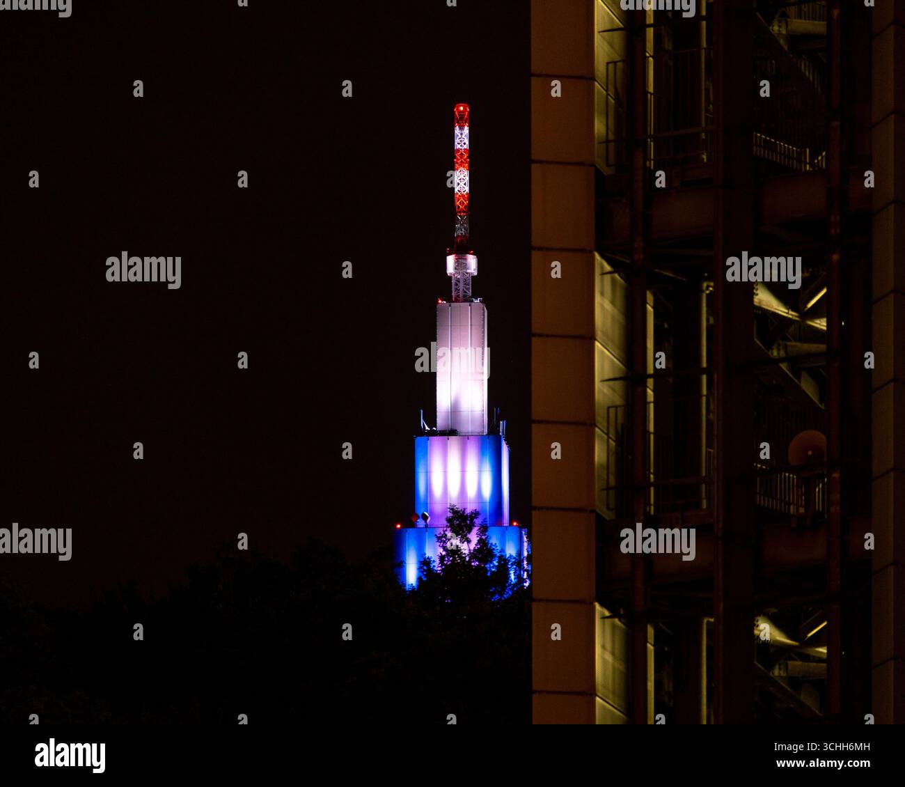 Illuminated Docomo Tower at night Shubuya, Japan - Stock Image