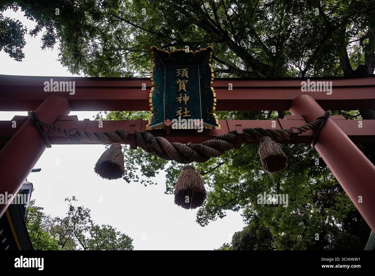 Wooden entrance to the Suga Shrine, Shinjuku, Tokyo, August 2025 - Stock Image