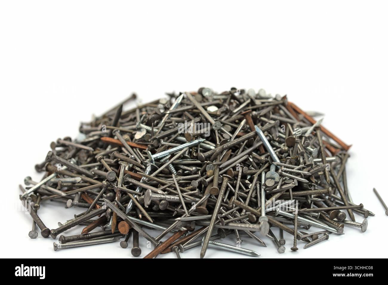 Many different nails against a white background Stock Photo