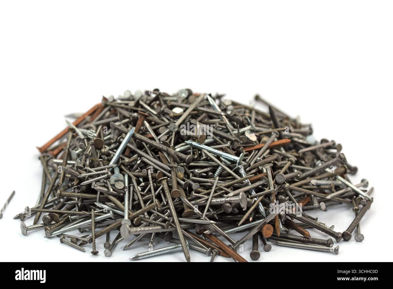 Many different nails against a white background Stock Photo