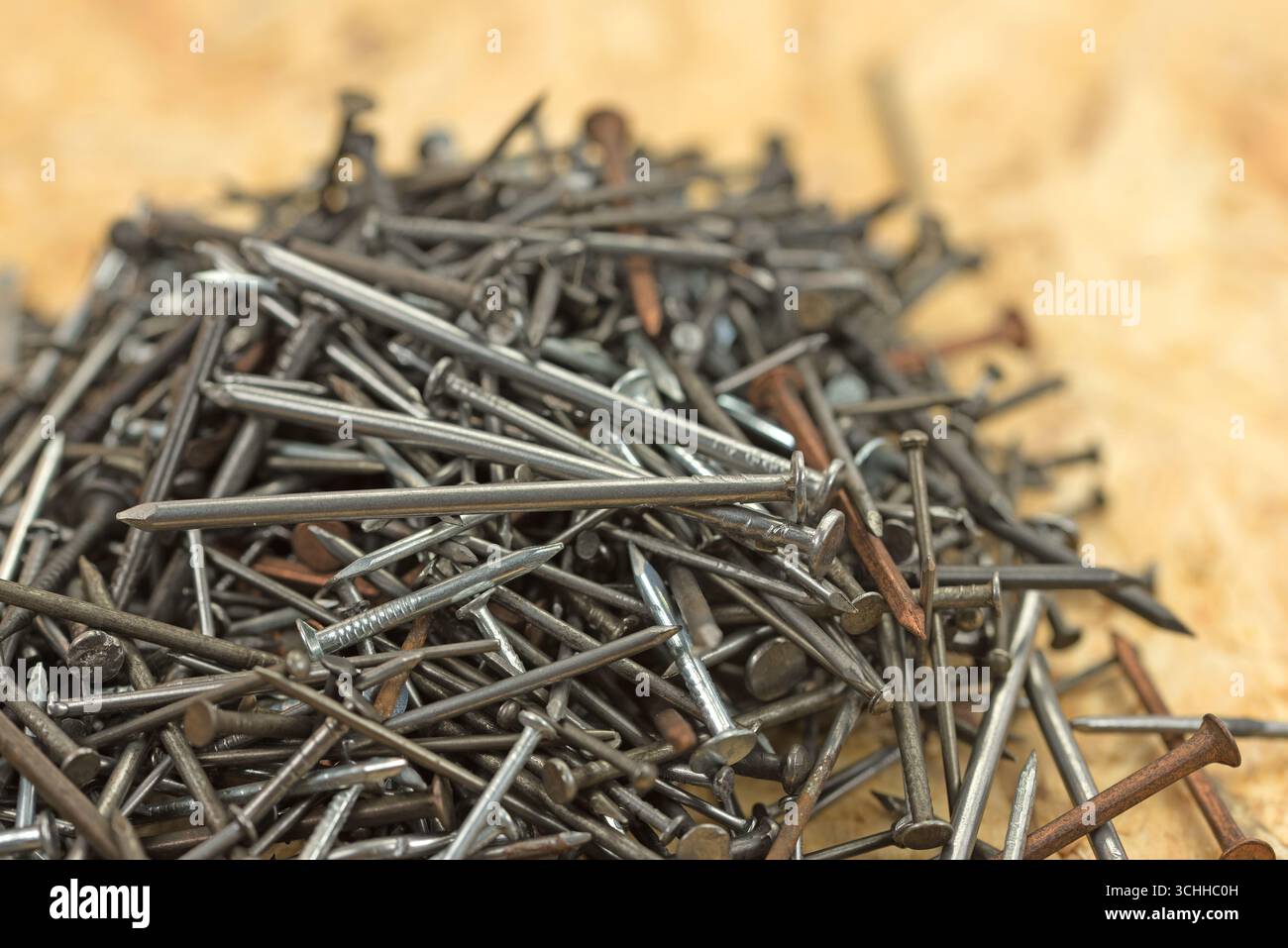 Many different nails against a white background Stock Photo