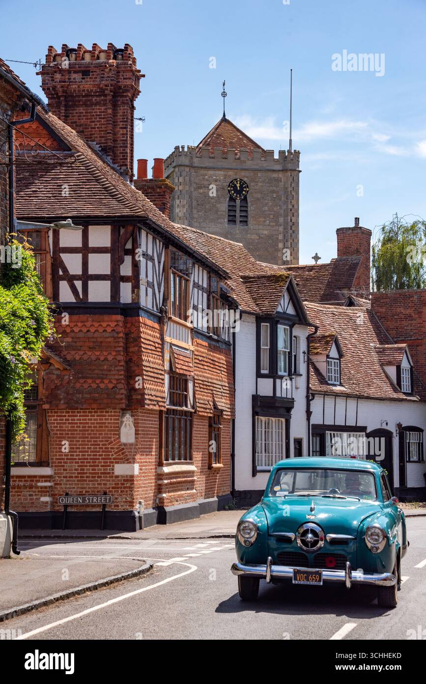 1950s-studebaker-car-drives-along-the-high-street-dorchester-on-thames