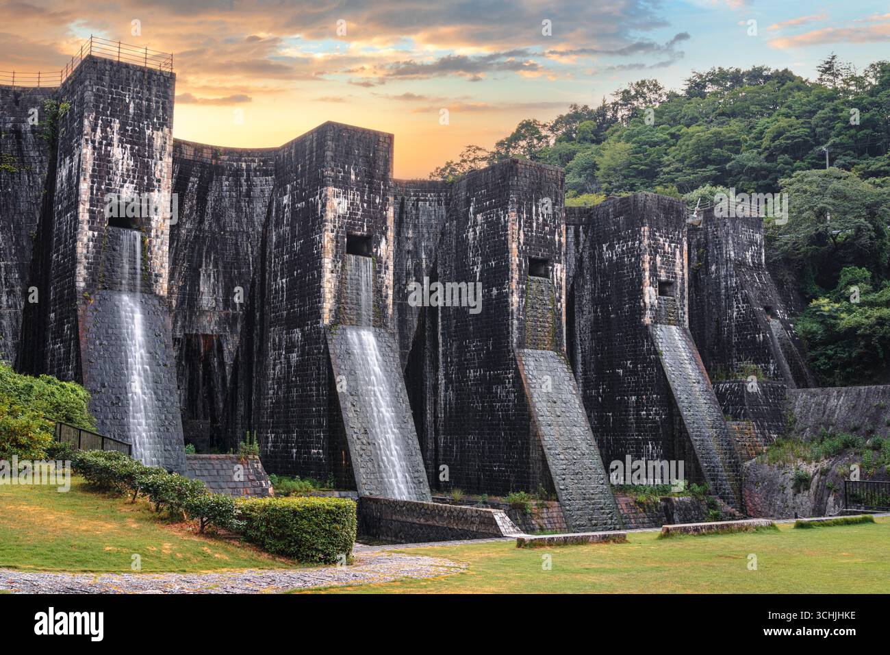 Honen'ike Pond Dam in the Sanuki Mountain range at Kan'onji, Kagawa Prefecture, Japan. The structure dates from 1930. Stock Photo
