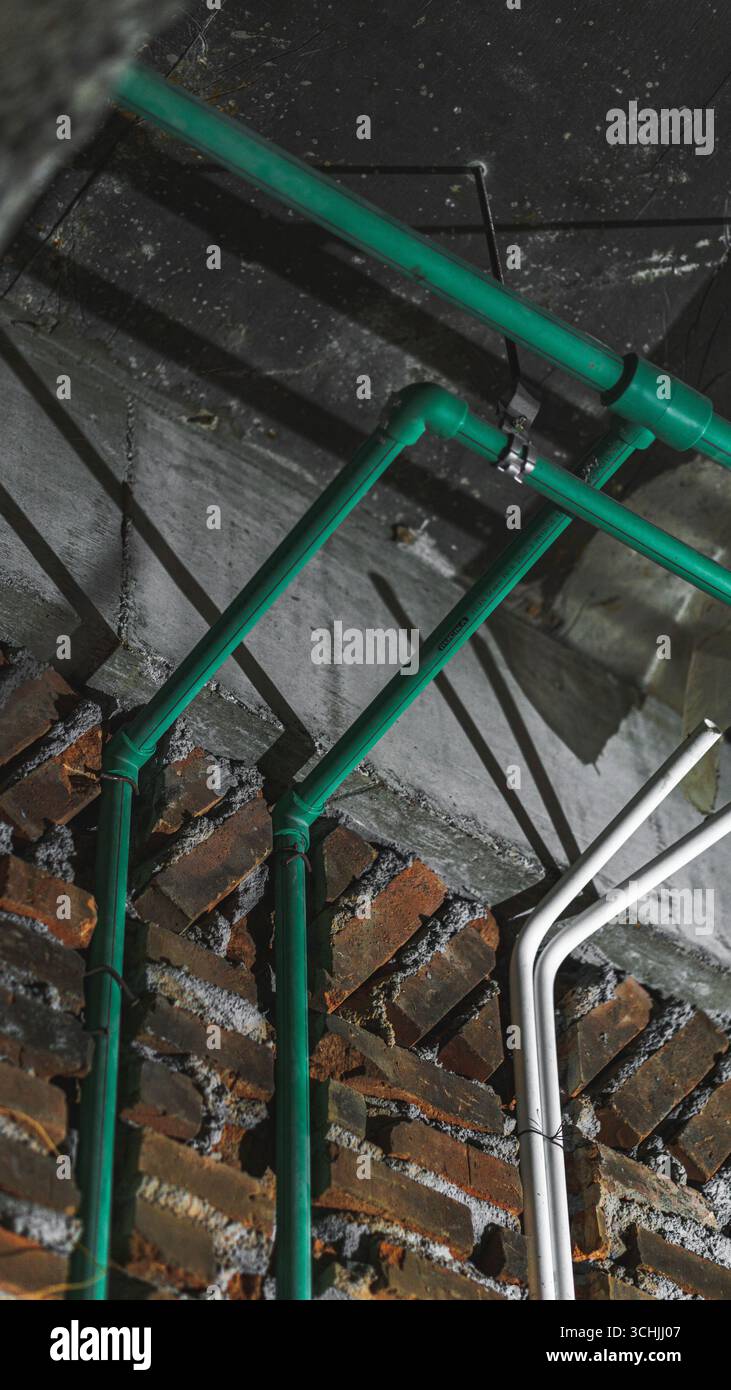 Green PPR pipe by Rucika, durable and reliable for clean water and hot water installations, ideal for plumbing and modern construction projects. Stock Photo
