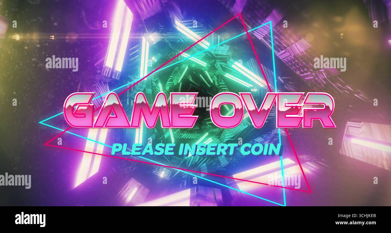 Displaying GAME OVER text pulsing at arcade interface, with crystalline cluster and neon frames Stock Photo