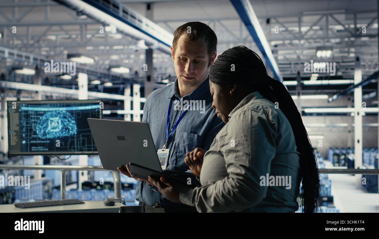 Team of data center programmers monitors deep learning process with ...
